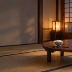 夕暮れの昭和の和室に、ちゃぶ台と二つのご飯茶碗が置かれたイメージ